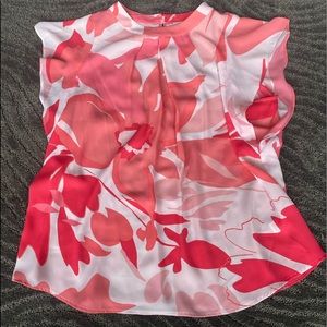 Tahari Size Large Floral different pink colors in this blouse and white.